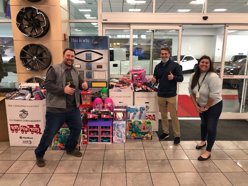 Oxford team members participating in Toys for Tots