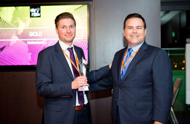 Two men receiving AgileOne’s Gold Award