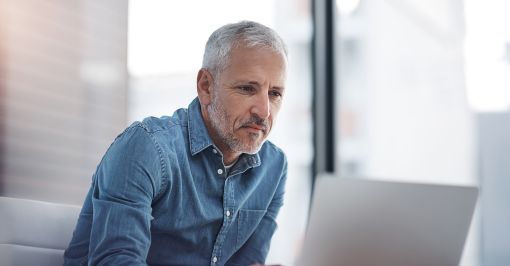 Man sitting at a computer